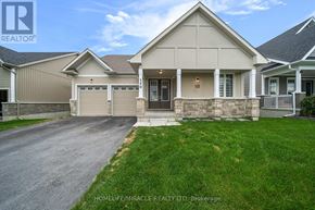 Loyalist (Bath) apartment for rent - A house with a grey roof and a white garage door.