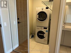 Vaughan (Concord) condo for rent - A washer and dryer in a small laundry room.