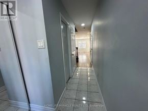 Mississauga (Lisgar) townhouse for rent - A long hallway with a door at the end.