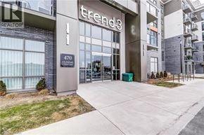 Waterdown condo for rent - The front of a building with the name Trends on it.
