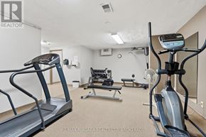 St. Catharines (Glendale/Glenridge) condo for rent - A well-equipped home gym with treadmills, elliptical machines, and other exercise equipment.