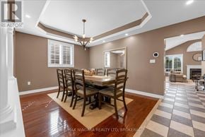 Niagara-On-The-Lake (Glendale) apartment for rent - A dining room with a checkered floor and a chandelier.