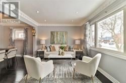 Toronto (Wexford-Maryvale) apartment for rent - A living room with a couch, chairs, and a rug.