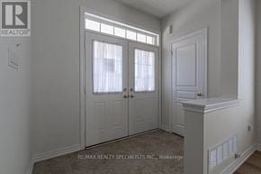 Milton (Sc Scott) apartment for rent - A room with a door and a window with curtains.