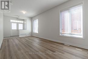 Milton (Sc Scott) apartment for rent - A room with a window and a door is on the market with RE/MAX Realty Specialists.