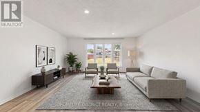 Oshawa (Lakeview) apartment for rent - A well-lit, spacious living room with a grey sofa, wooden coffee table, and a large window.