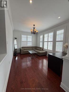 Vaughan (Patterson) apartment for rent - A large open living room with wood floors and a chandelier.