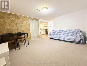 Richmond Hill (Crosby) apartment for rent - A living room with a couch, chair, and table.