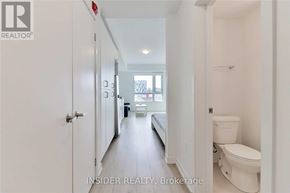 Oshawa (Samac) condo for rent - A white bathroom with a toilet and sink.