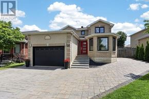 Barrie (Holly) apartment for rent - A house with a red door and a driveway in front.