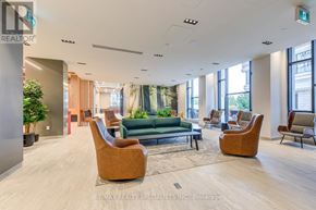 Mississauga (Central Erin Mills) condo for rent - A spacious waiting area with brown chairs and a green couch.