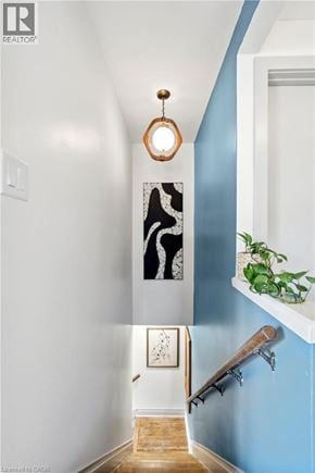 Hamilton apartment for rent - A hallway with a white wall and a blue wall.