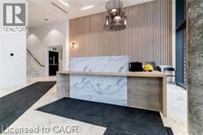 Kitchener condo for rent - A hallway with a washing machine on the right side.