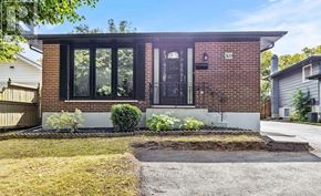 Niagara Falls (Church's Lane) apartment for rent - A modern house with a brick facade and a black door.