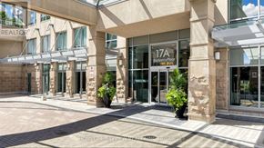 Toronto (Bayview Village) condo for rent - The entrance to a building with a glass door and a sign that reads "17A Berry Place".
