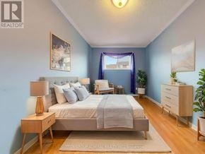 Vaughan (Maple) townhouse for rent - A bedroom with a bed, nightstand, and a window with curtains.