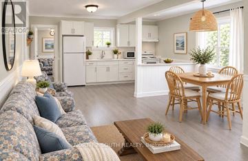 Tiny apartment for rent - A well-lit kitchen and living room with a floral sofa.