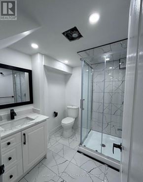 Brampton (Credit Valley) apartment for rent - A bathroom with a glass shower door and a marble countertop.