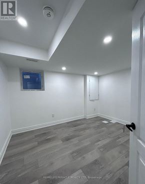 Brampton (Credit Valley) apartment for rent - A room with a grey floor and white walls.