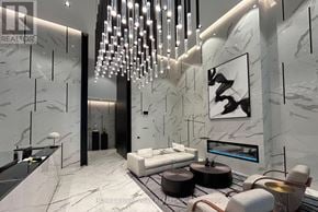 Toronto (Church-Yonge Corridor) condo for rent - A modern living room with a marble floor and a chandelier.