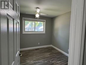 London South (South X) apartment for rent - A room with a window and a ceiling fan.