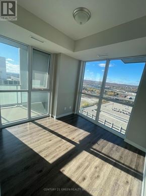 Burlington (Freeman) condo for rent - A room with a view of the city from a large window.