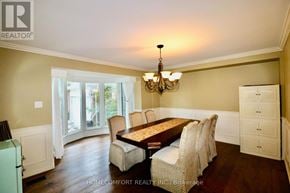 Aurora (Aurora Highlands) apartment for rent - A dining room with a wooden table and chairs.