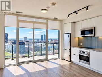 Toronto (Regent Park) condo for rent - A kitchen with a view of the city.