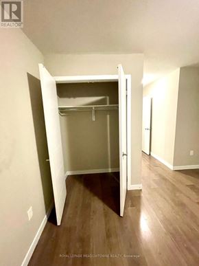 Barrie (Ardagh) townhouse for rent - A room with a closet and a doorway leading to another room.