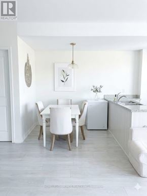 Brampton (Goreway Drive Corridor) townhouse for rent - A white dining room with a table and chairs.