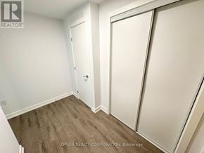 Vaughan (Vaughan Corporate Centre) condo for rent - A room with a white door and a white wall.