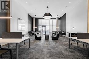 Unionville condo for rent - A modern office space with a reception desk and multiple seating areas.