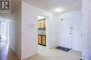 Toronto (L'amoreaux) condo for rent - A white room with a door and a window.