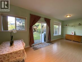 Burnaby apartment for rent - A room with a table and a window.