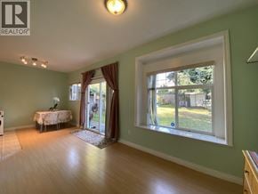 Burnaby apartment for rent - A room with a table and chairs in it.