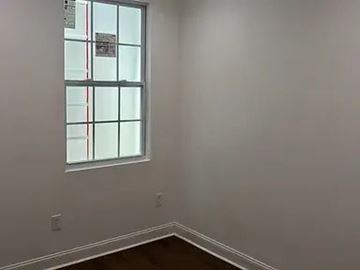 Washington apartment for rent - A room with a window and a white wall.