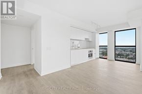 Toronto (Thorncliffe Park) condo for rent - A spacious, empty room with a view of the cityscape outside the window.