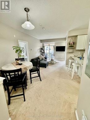 Oakville (Ro River Oaks) townhouse for rent - A dining room with a table and chairs.