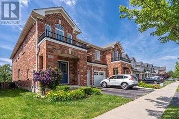Burlington (Alton) apartment for rent - A house with a car parked in front of it.