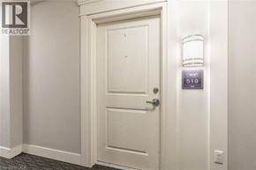 Milton condo for rent - A white door with a keypad on the wall.