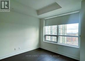 Mississauga (Fairview) condo for rent - A room with a window that has a view of a city.