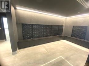 Markham (Unionville) condo for rent - A room with a long black board on the wall and a white floor.