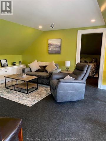 Windsor apartment for rent - A living room with a grey couch and a coffee table.