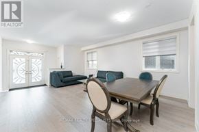 Hamilton (Waterdown) apartment for rent - A dining room with a table set for four.