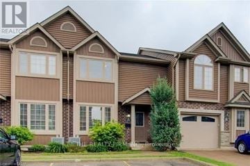 London South (South W) townhouse for rent - A large, two-story house with a garage is shown.