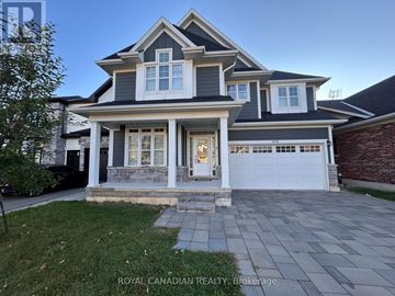 Hamilton (Meadowlands) apartment for rent - A large, two-story house with a garage is shown.