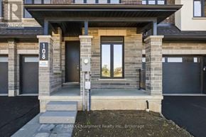 Hamilton (Waterdown) townhouse for rent - The front entrance of a building with the number 108 on it.