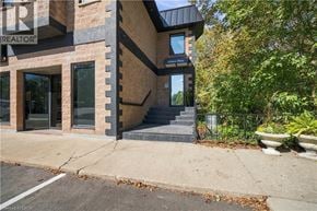 Hamilton apartment for rent - A building with a sign that says REALTOR on it.