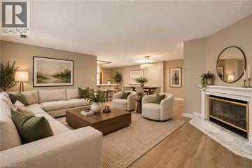 Hamilton apartment for rent - A living room with a fireplace and a large painting on the wall.