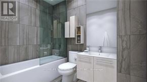 Toronto (Mount Pleasant West) condo for rent - A bathroom with a tub, toilet and sink.